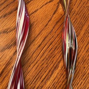 A set of two art glass ornaments